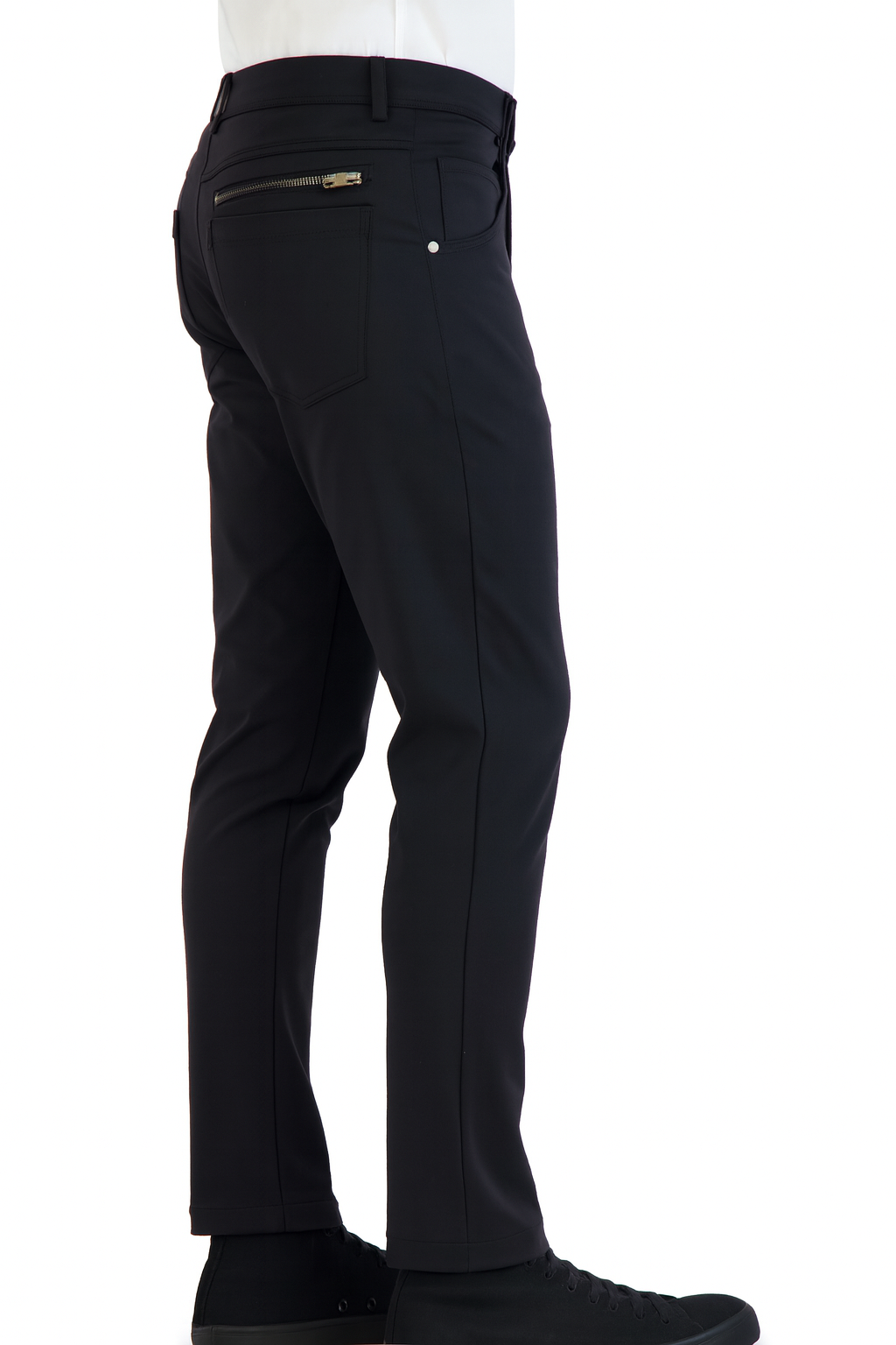 Black performance chinos — four-way stretch detail