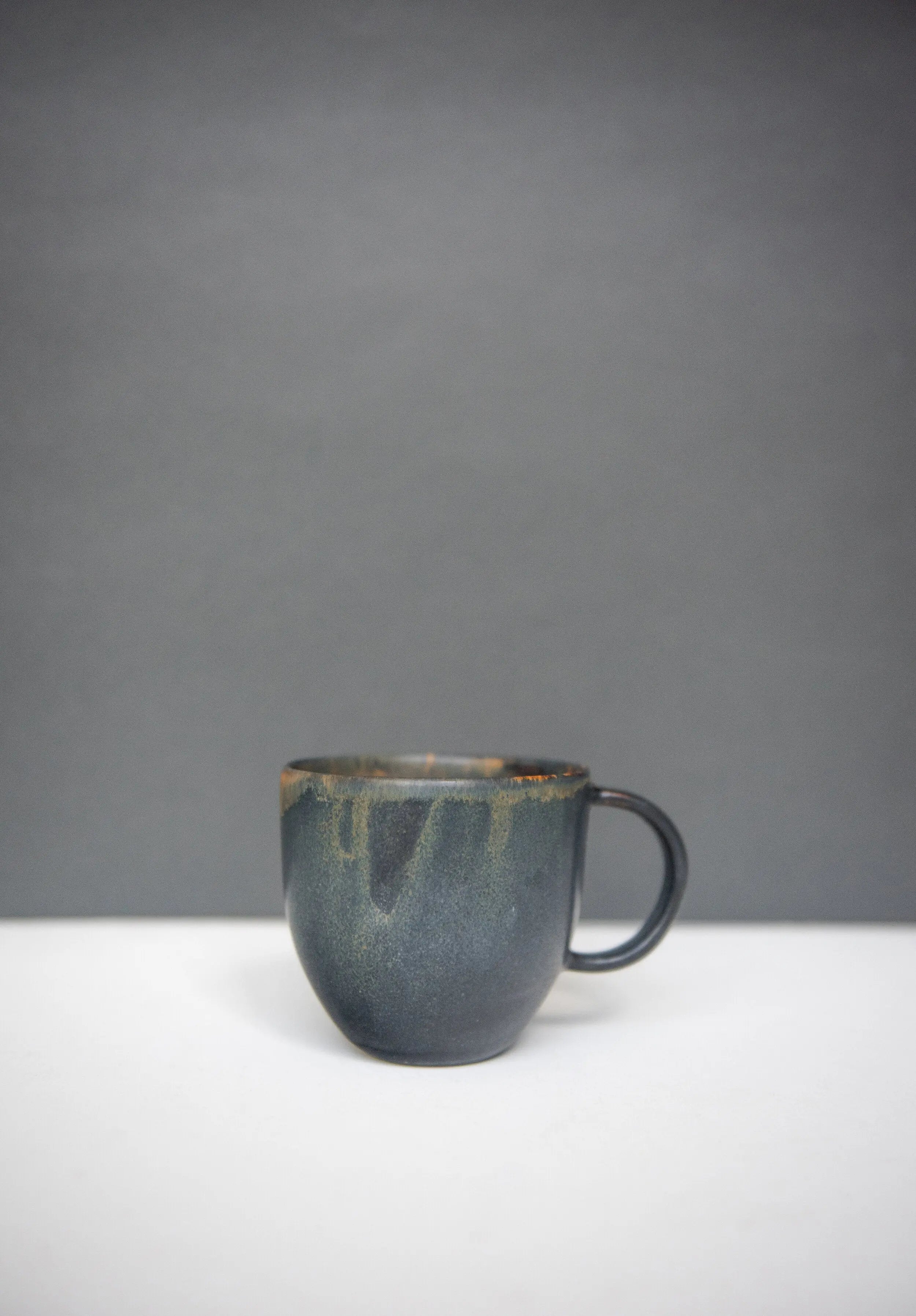 Rust Stoneware Coffee Mug CREATING COMFORT