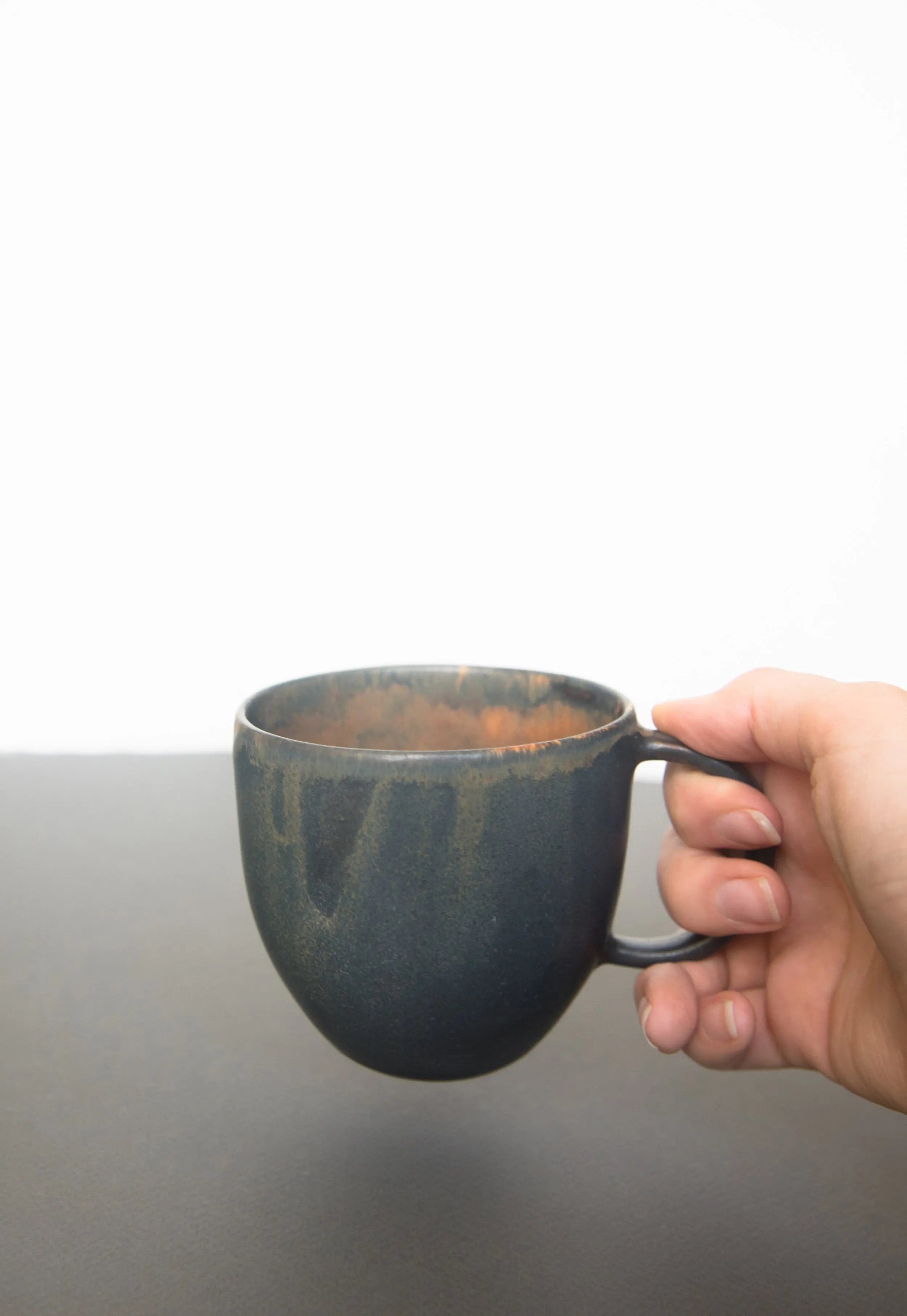 Rust Stoneware Coffee Mug CREATING COMFORT