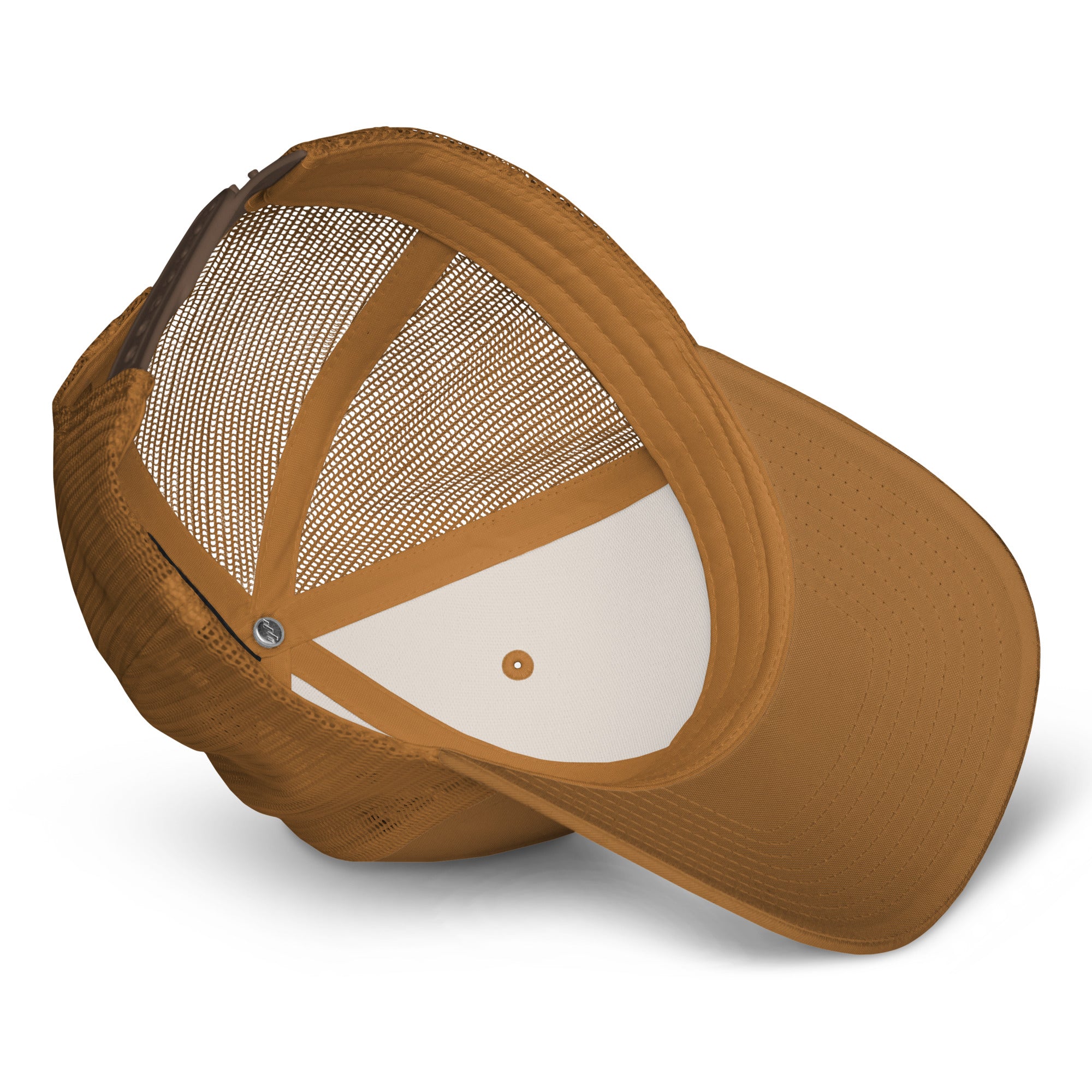 CBY CLE graffiti trucker hat in caramel — close-up of white-and-gold graffiti mark